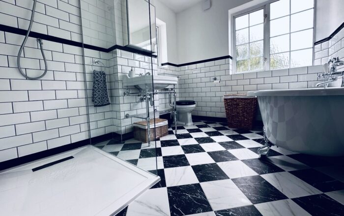 Checkerboard tile flooring detail in Victorian bathroom renovation, New Eltham.
