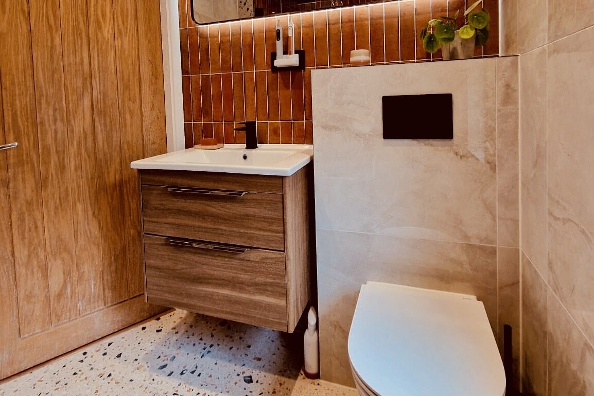 Bespoke Bathroom Renovation with Elevated Ceilings & Terrazzo Flooring