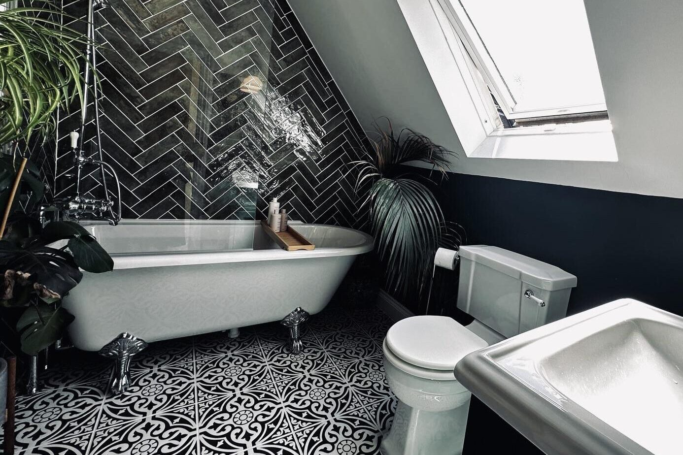 Luxury Victorian Bathroom Oasis with Green Herringbone Tiles