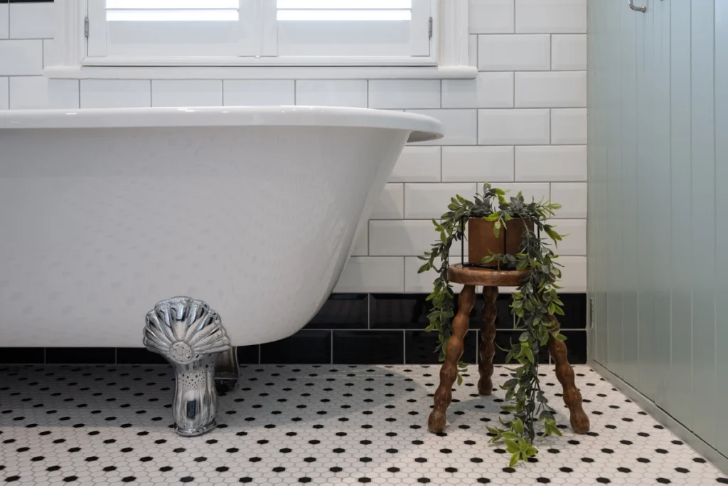blackheath-victorian-bathroom-clawfoot-bath-detail Close-up of clawfoot bath and patterned floor tiles in a Victorian bathroom.