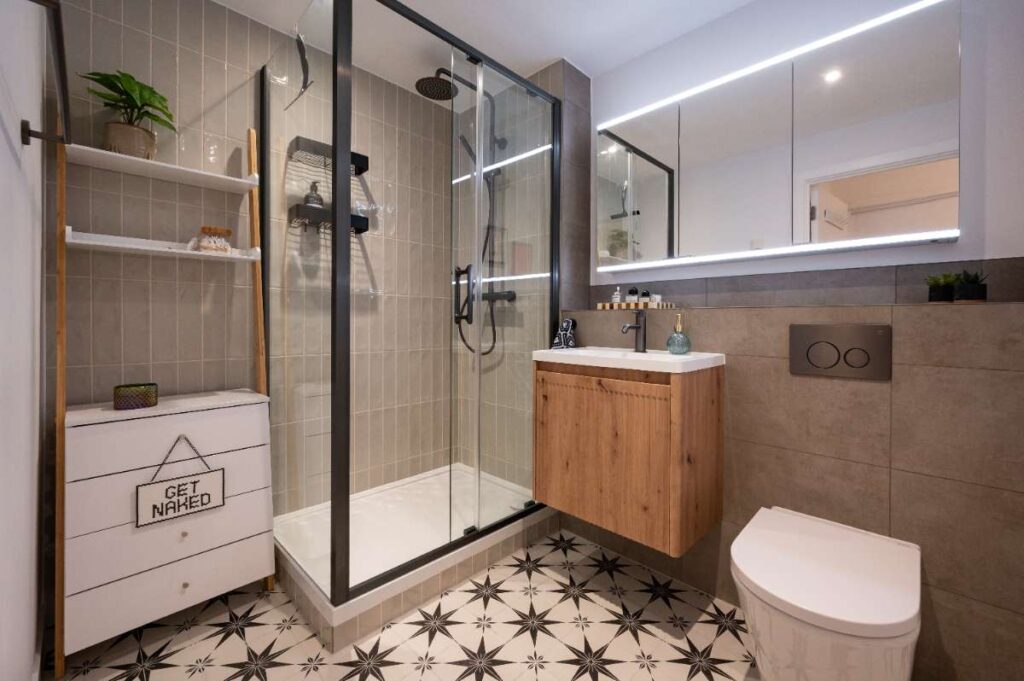 small-modern-bathroom-patterned-floor-tiles-walk-in-shower.jpg