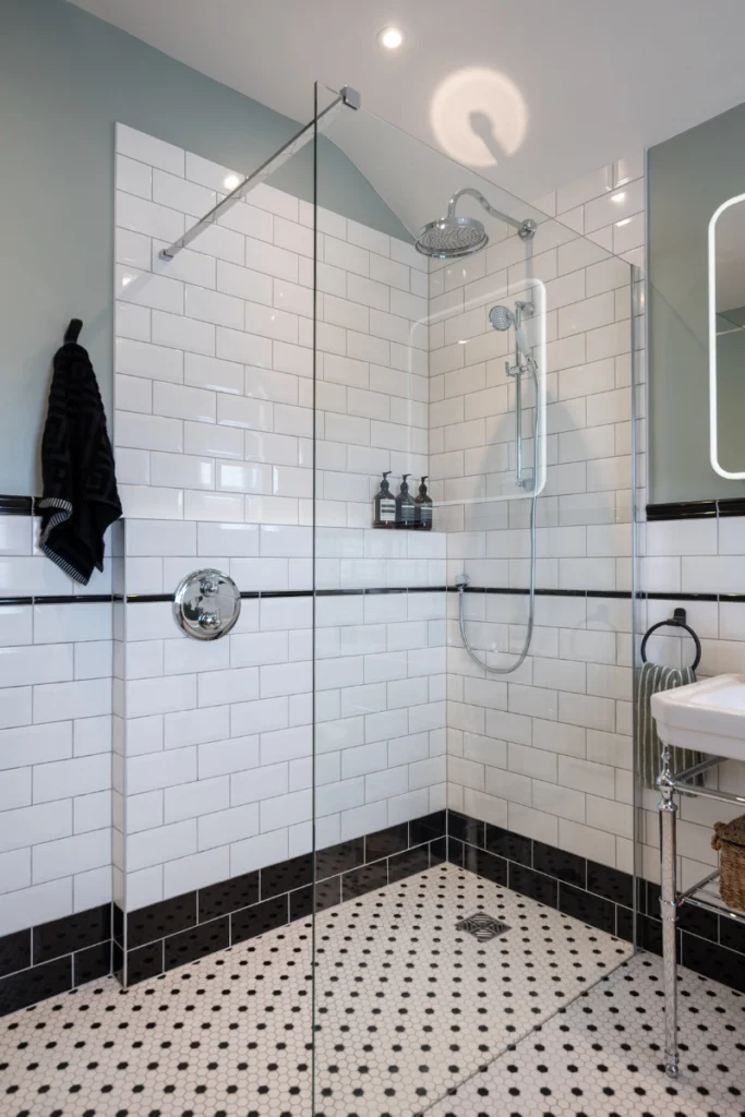 victorian-style-walk-in-shower-in-blackheath Walk-in shower with white metro tiles in a Victorian-style bathroom renovation.